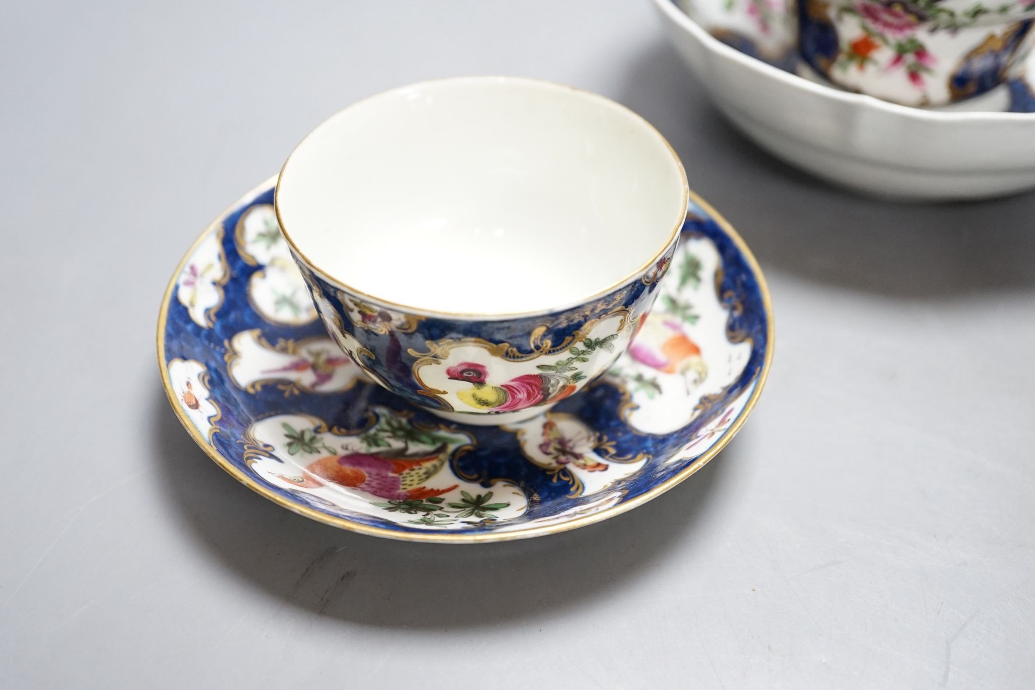 A Worcester scale blue chocolate cup and saucer and a pair of similar tea bowls and saucers, circa 1775